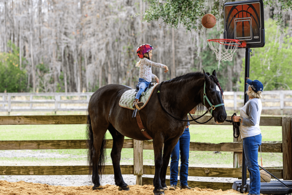 Gracie & Vino shooting hoops